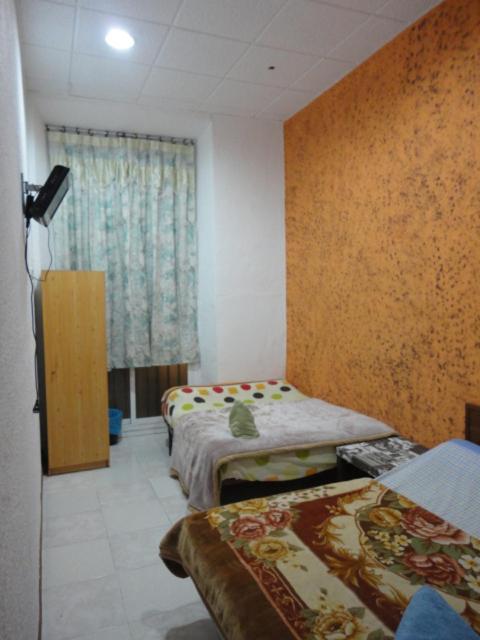 Vierpersoonskamer met Gedeelde Badkamer